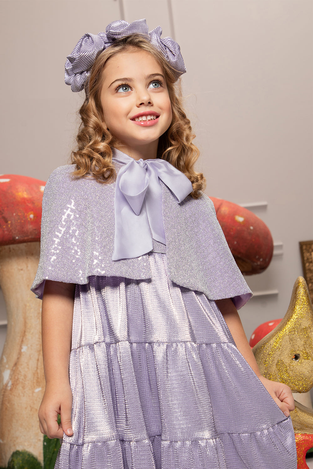 Micro pleated violet cape with pussy bow