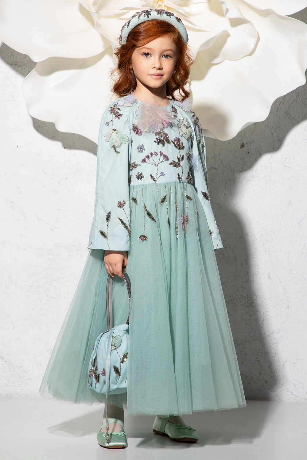 Mint blue tulle dress with floral hand-made embroidery and cape sleeves