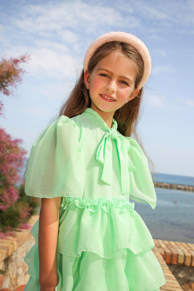 Mint chiffon dress with fills and pussy bow
