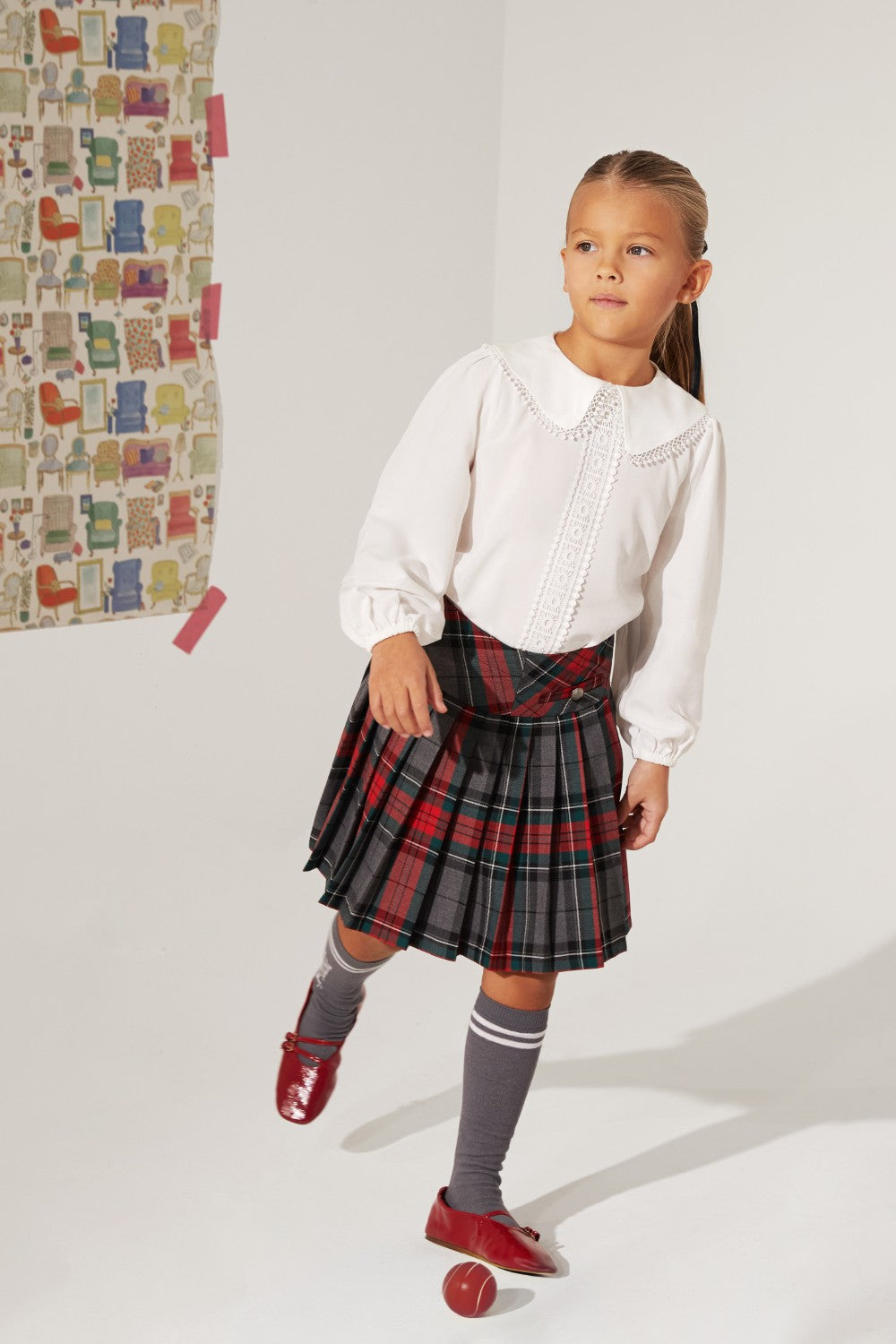 White woven viscose shirt with intricate embroidered details for children.