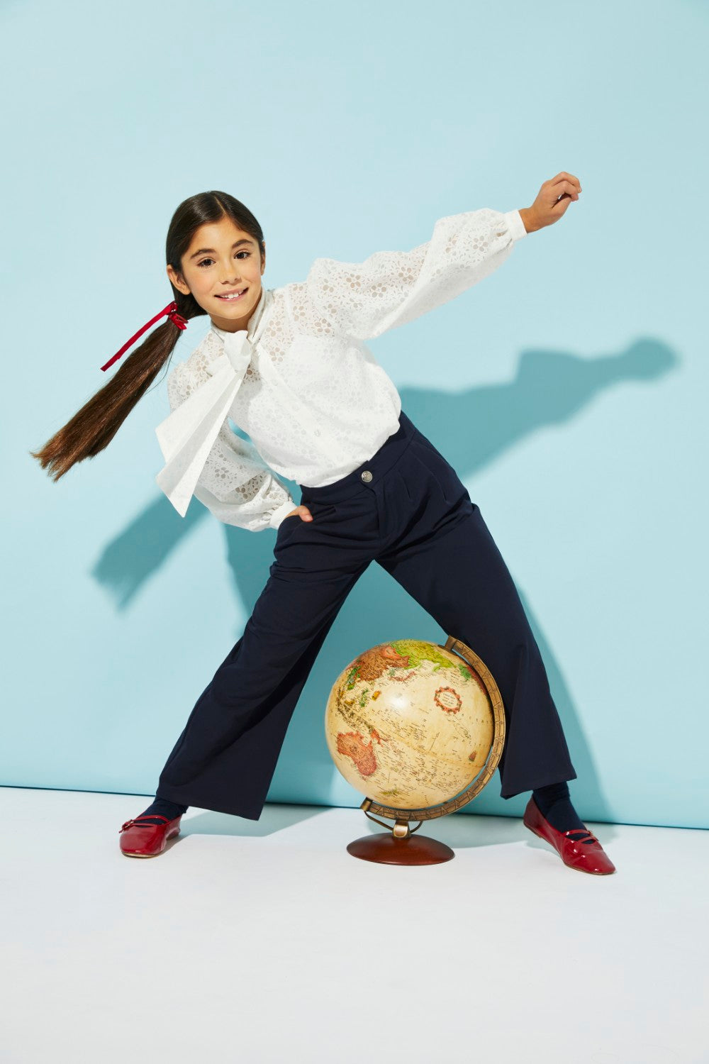 White woven cotton floral shirt with pussy bow and voluminous sleeves.