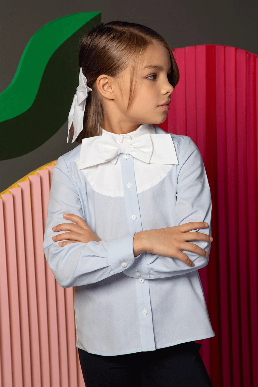 Light blue shirt with white collar and large bow