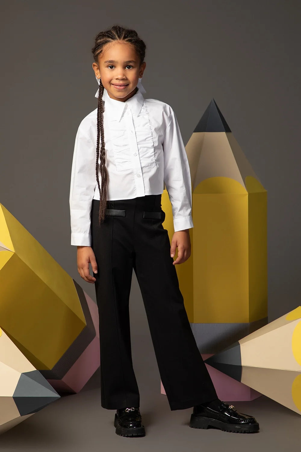 Black elegant trousers with straight fit and faux leather