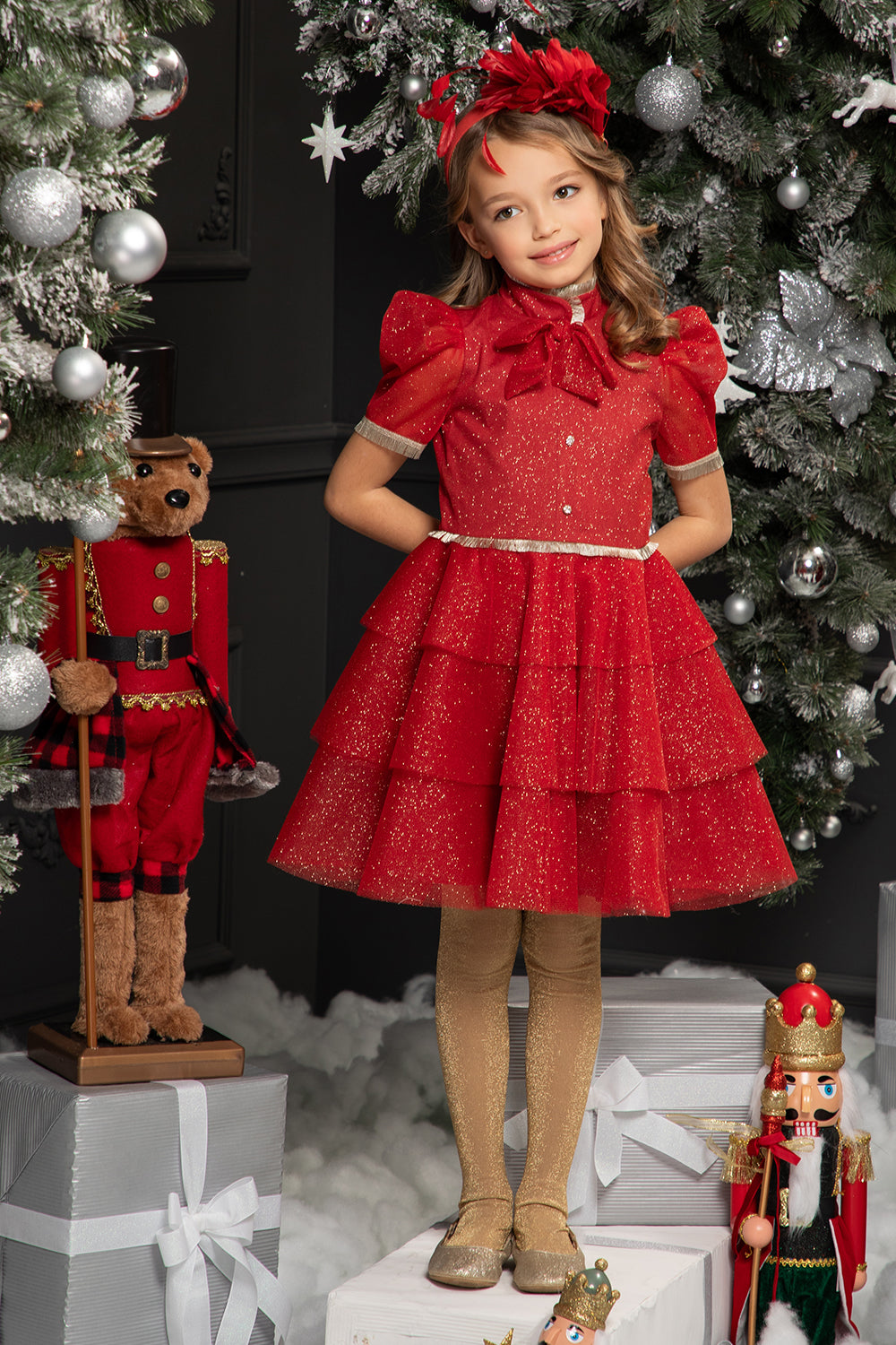 Red shimmering tulle layered dress with gold fringes and bow