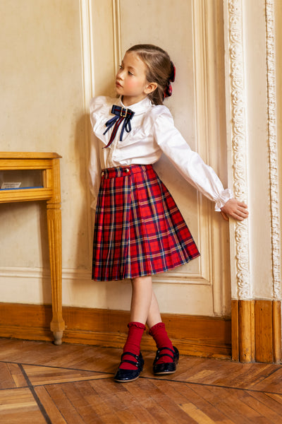 Red and blue tartan pleated cotton skirt with gold buttons with coat of arms