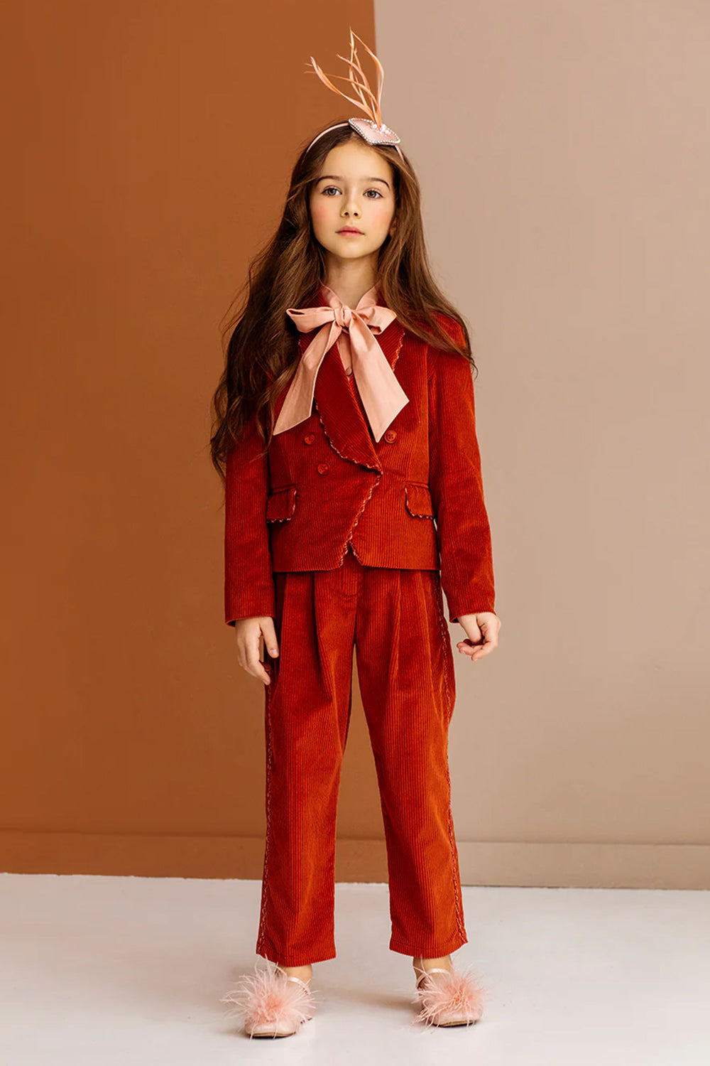 Rusty orange corduroy cotton trousers matching trimming