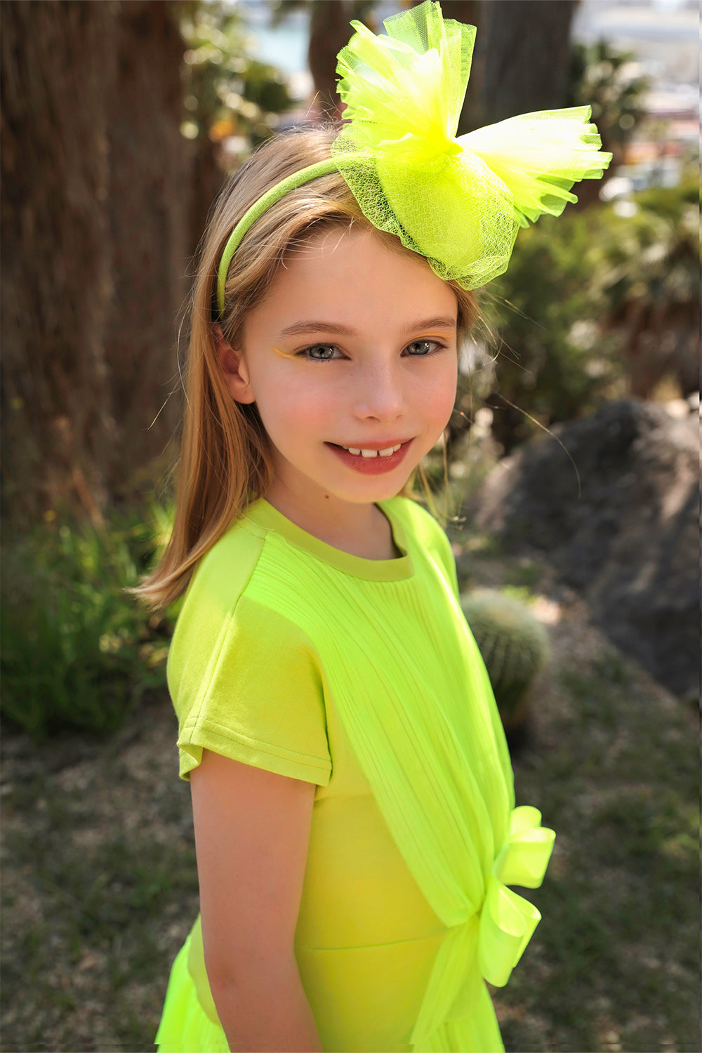 Yellow/green neon jersey dress with tulle and satin bow