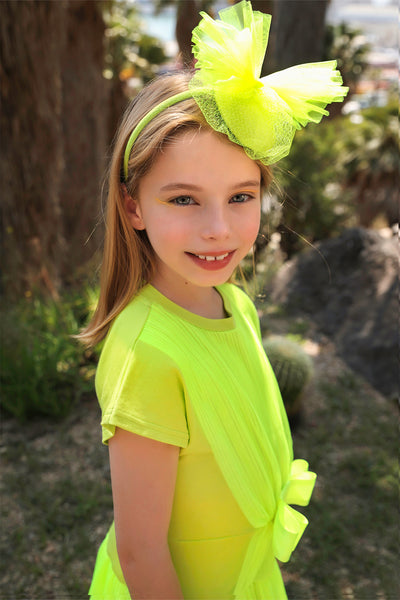 Yellow/green neon jersey dress with tulle and satin bow
