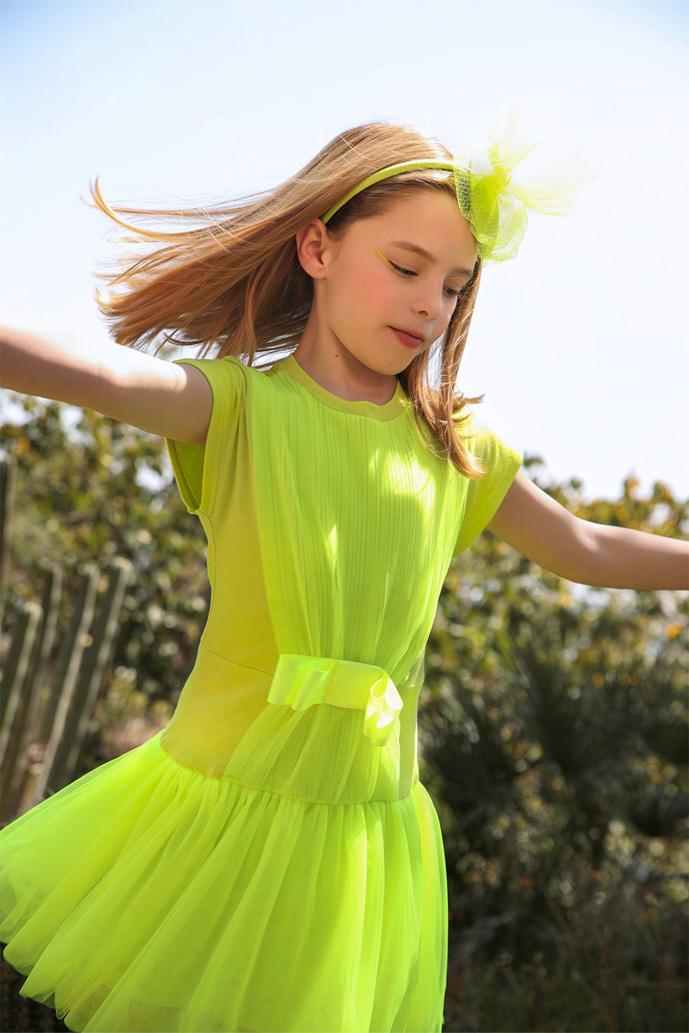 Yellow/green neon jersey dress with tulle and satin bow