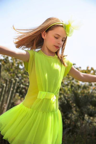Yellow/green neon jersey dress with tulle and satin bow