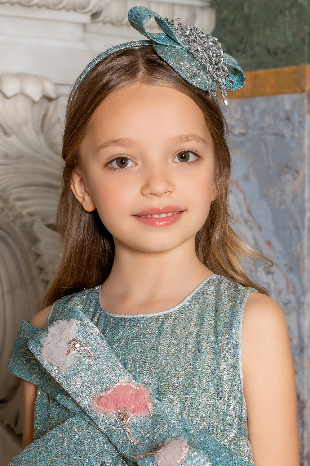 Blue shimmering headband with silver decoration