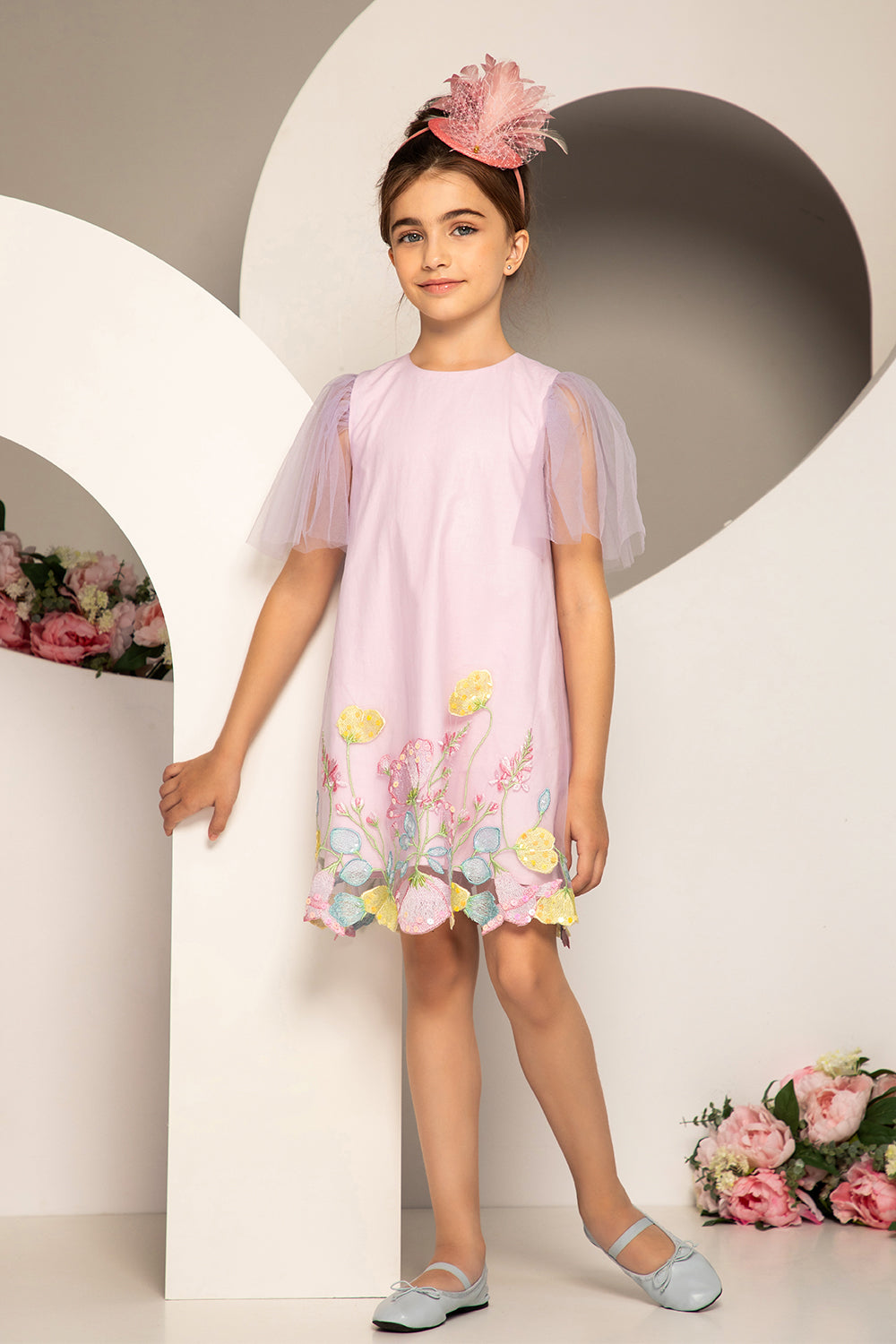Pale lilac dress with pastel colors floral embroidery and tulle sleeves