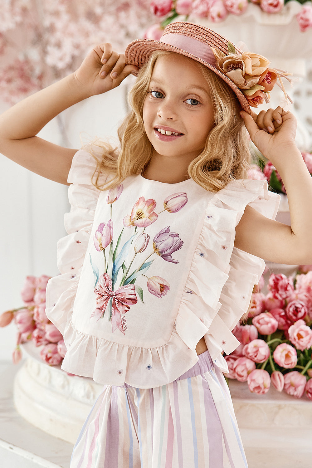 Light pink tulip print satin cotton top with frills and side bows and hand-embellishments
