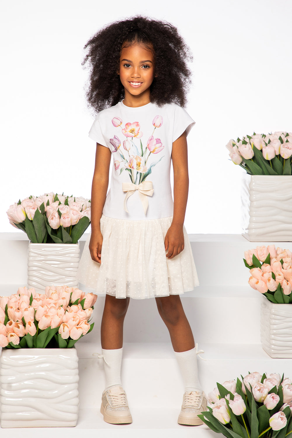 White jersey tunic dress and tulip print and cotton tulle skirt