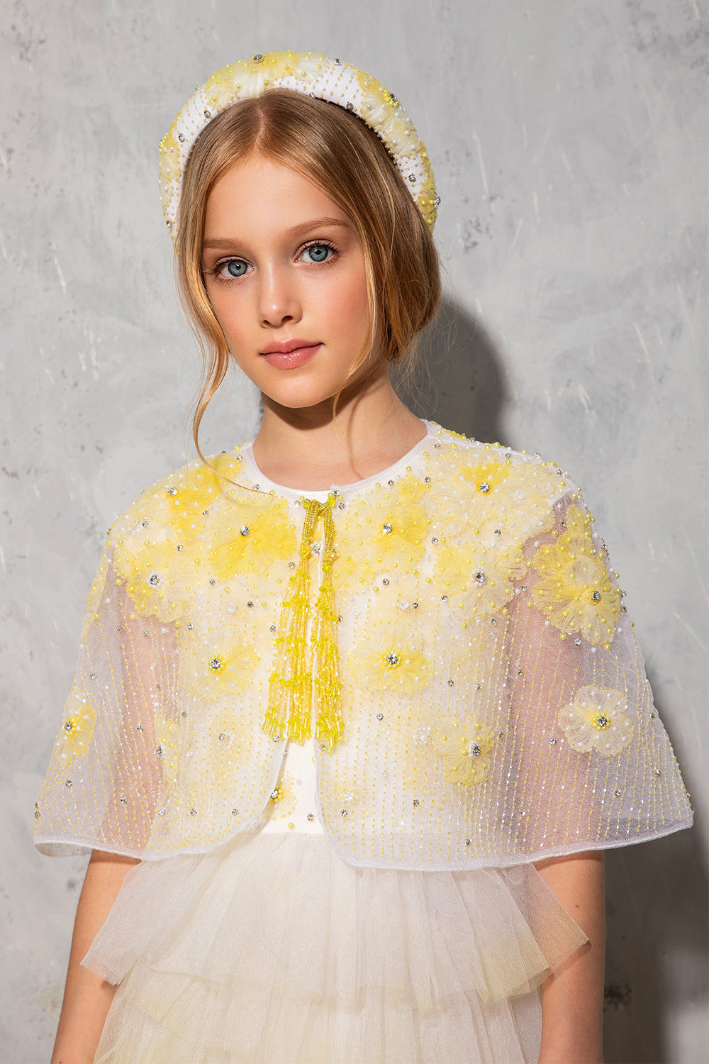 Hand-embellished yellow flower cape with beaded tassels