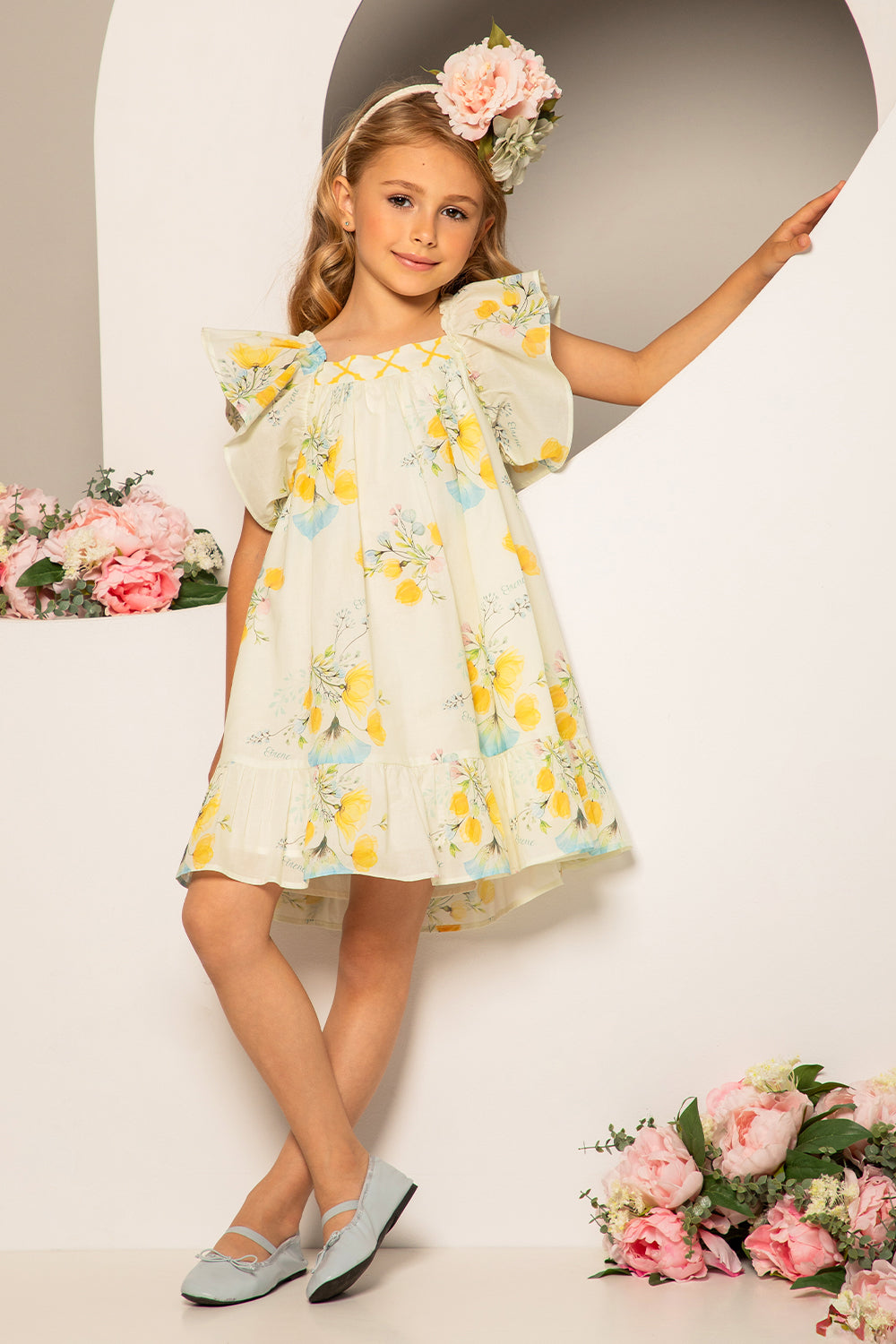 Pale yellow satin cotton floral print dress with big bow on the back