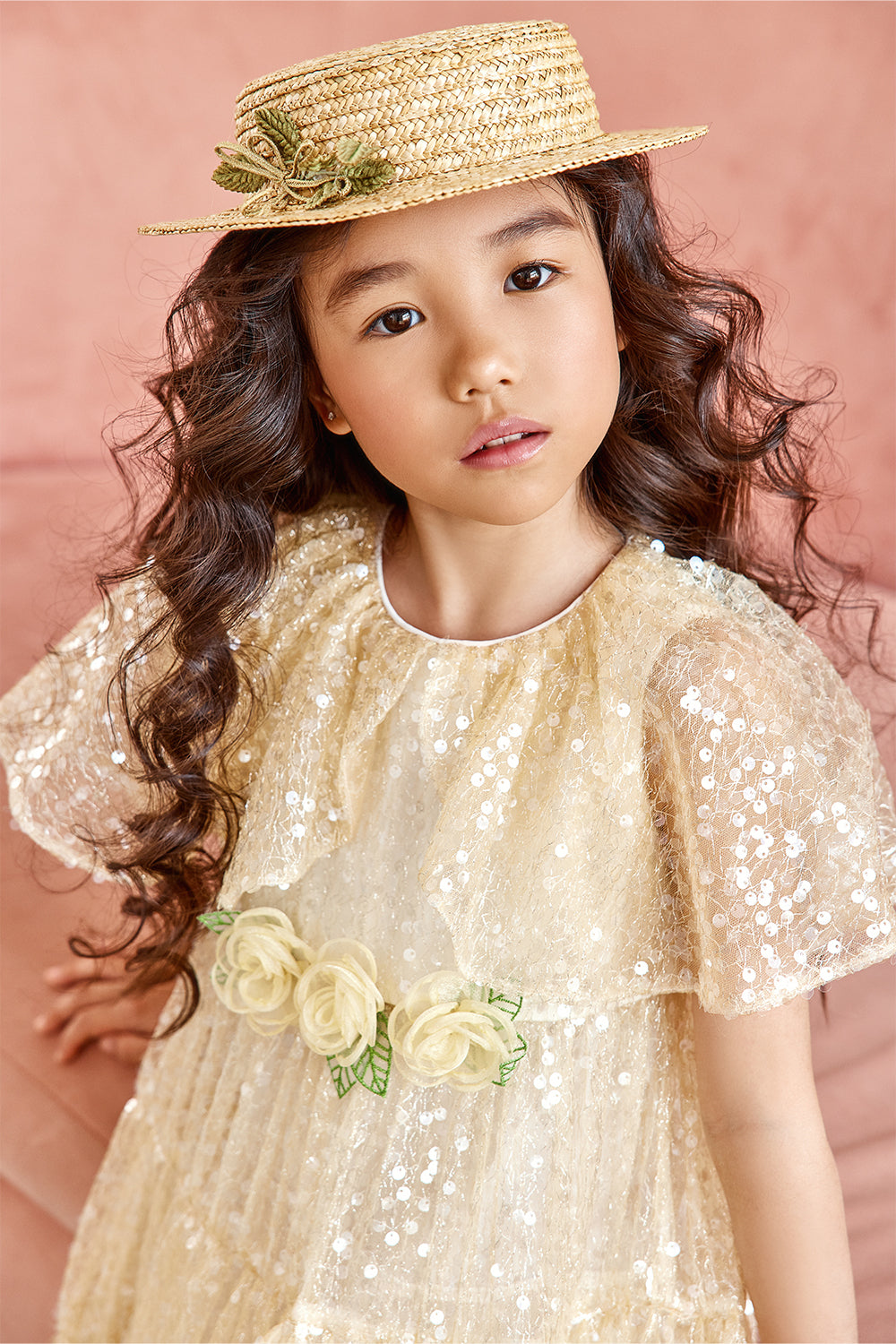 Light yellow sequin dress with flower decorations and cape sleeves