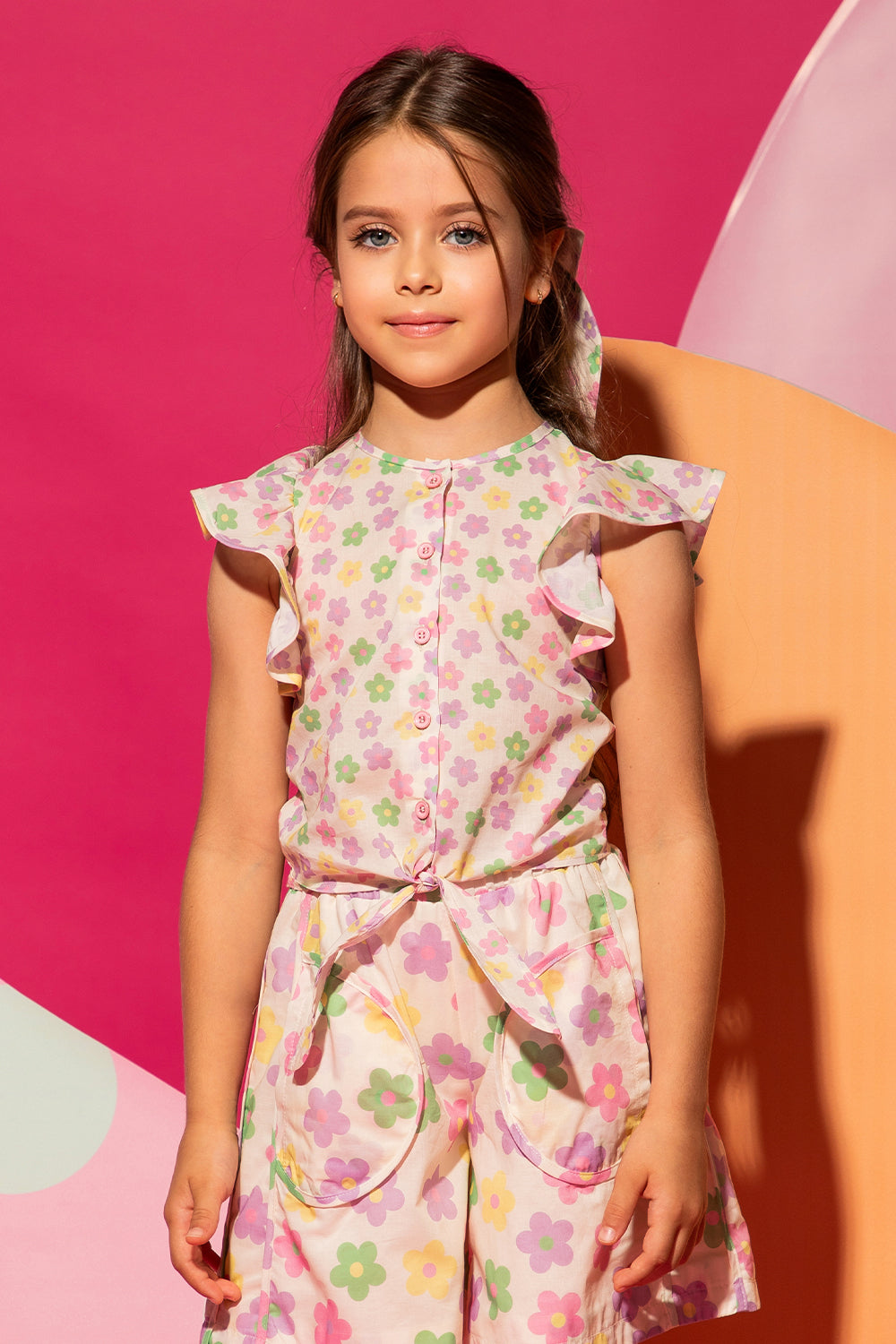 Off-white sleeveless satin cotton shirt with multi color flowers