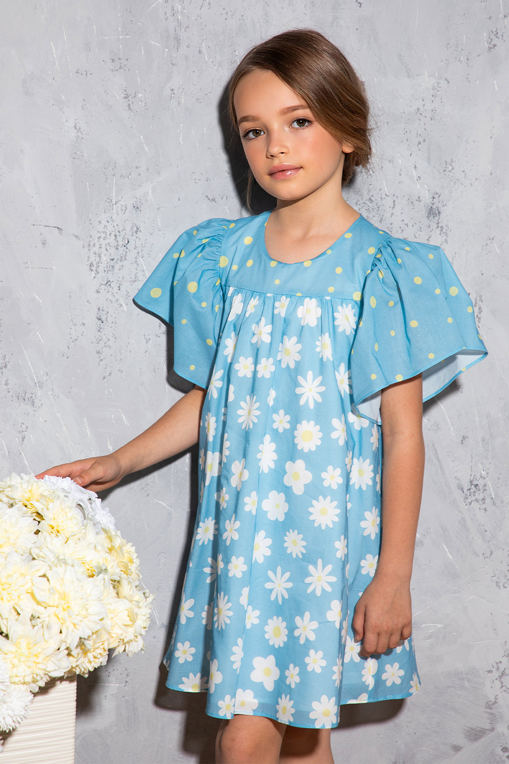 Blue satin cotton dress with white daisies and cape sleeves