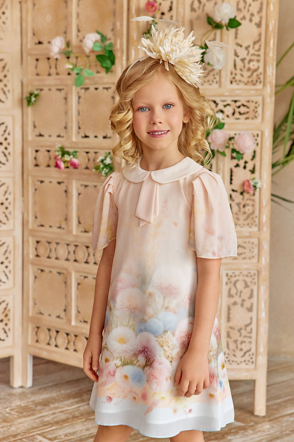 Soft pink A-line dress with falling sleeves, peter pan collar and pastel floral print
