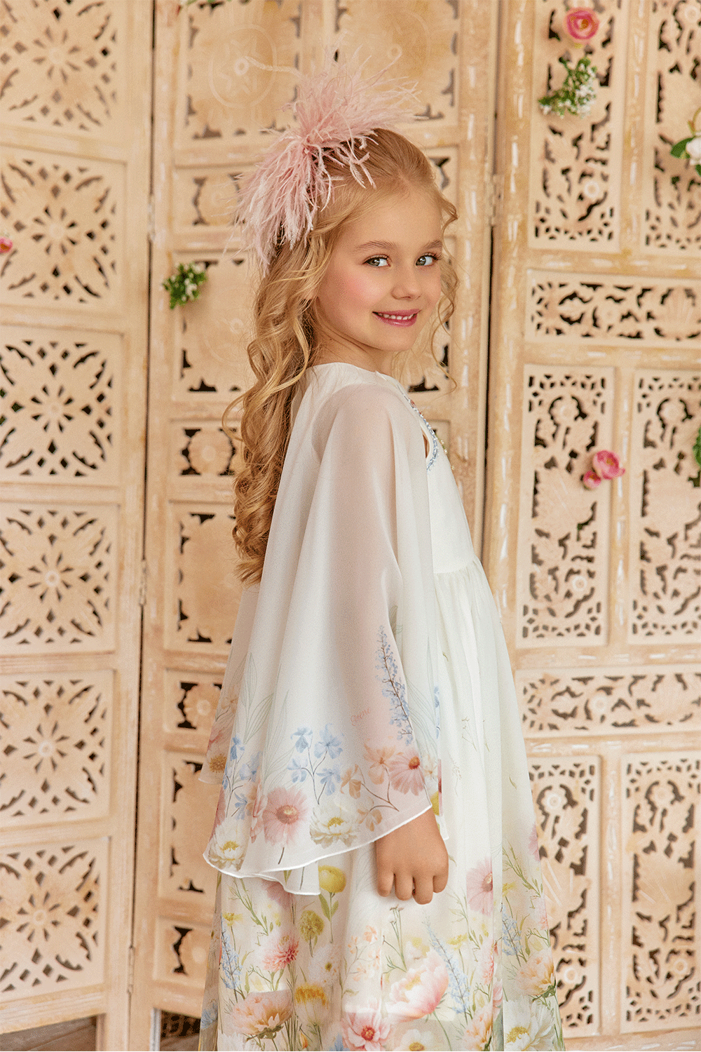 White chiffon dress with floral print, flowing sleeves and delicate hand-embelishement