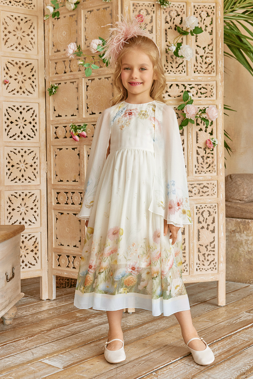 White chiffon dress with floral print, flowing sleeves and delicate hand-embelishement
