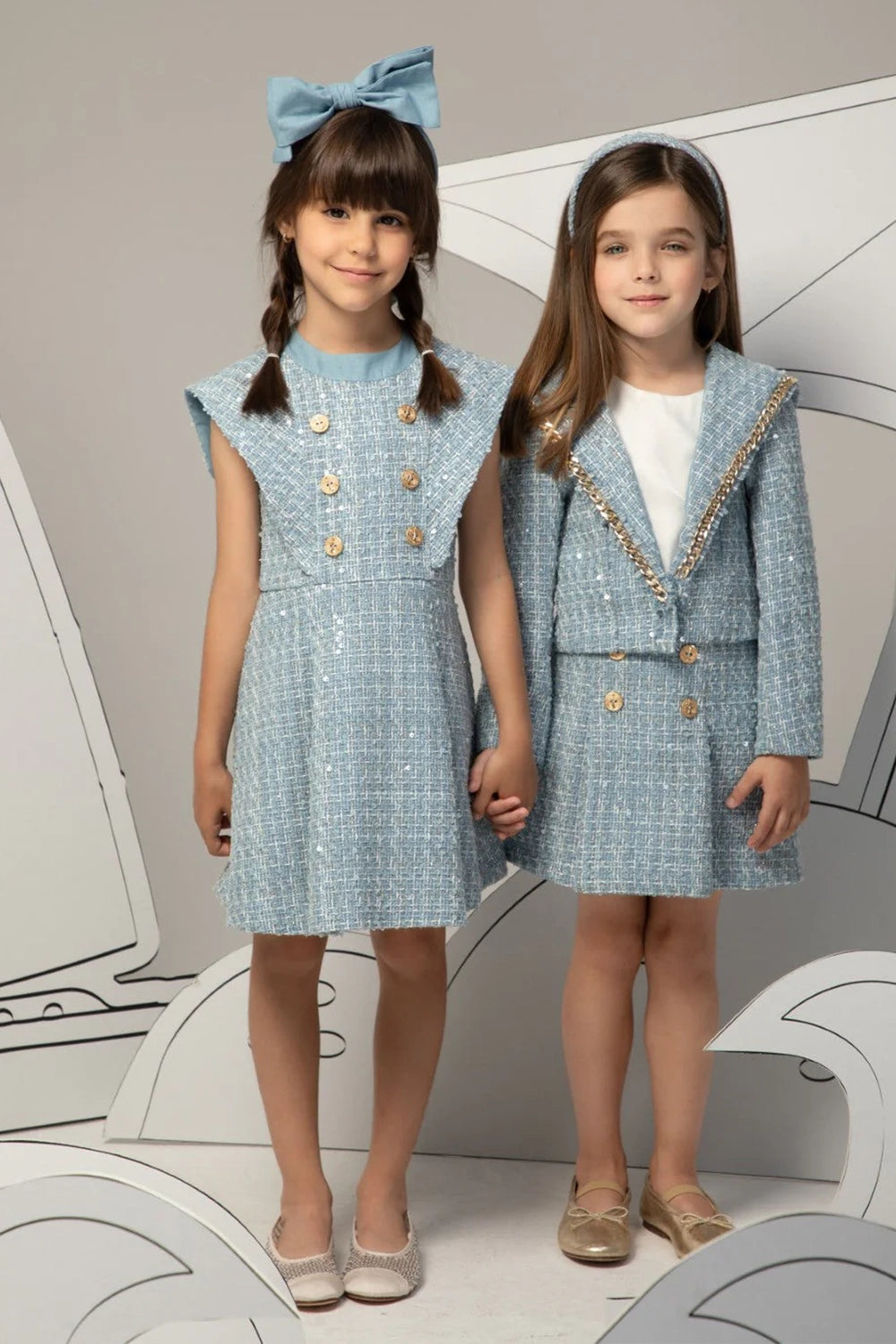 Light blue tweed dress with subtle sequins and double-breasted gold anchor buttons