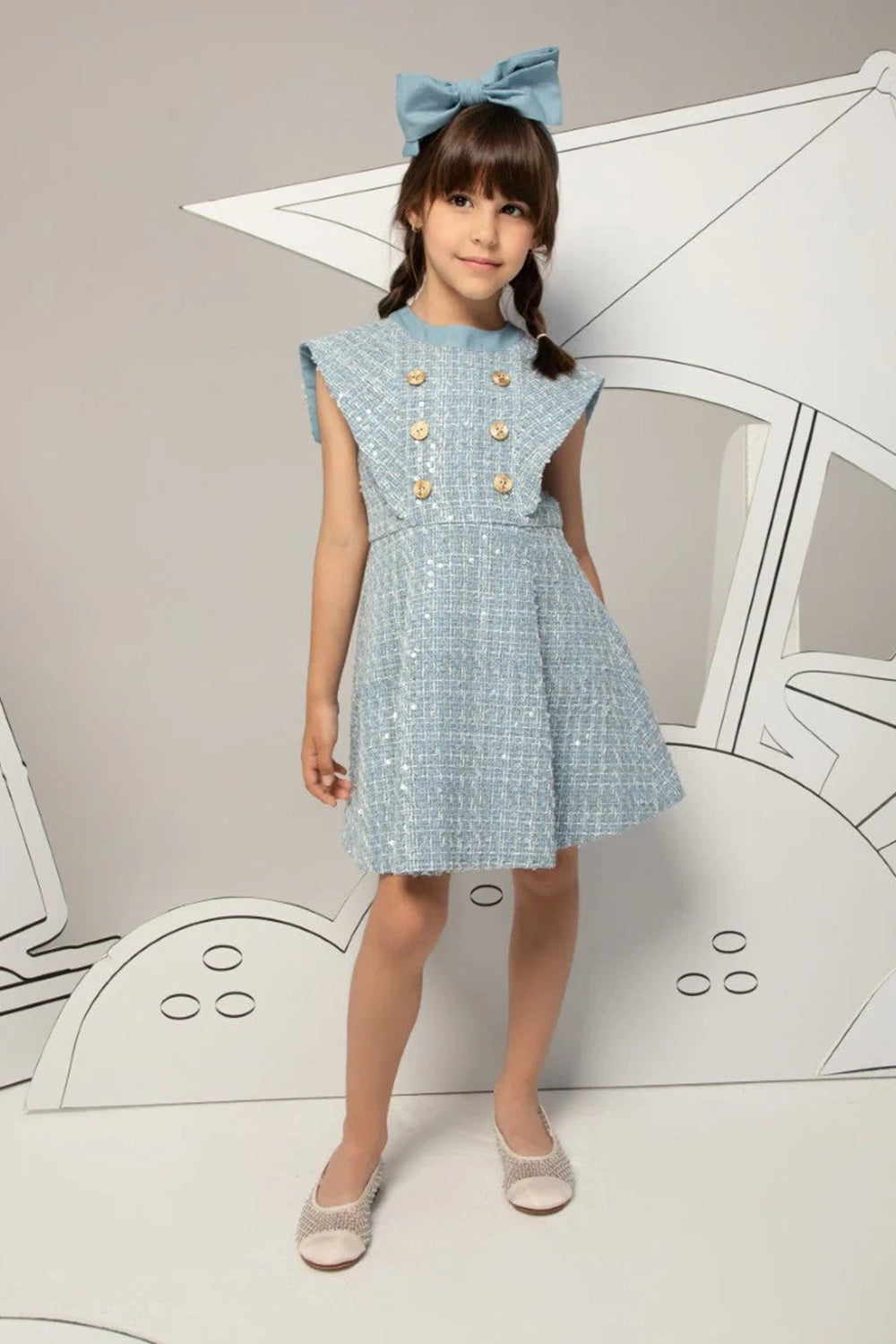 Light blue tweed dress with subtle sequins and double-breasted gold anchor buttons