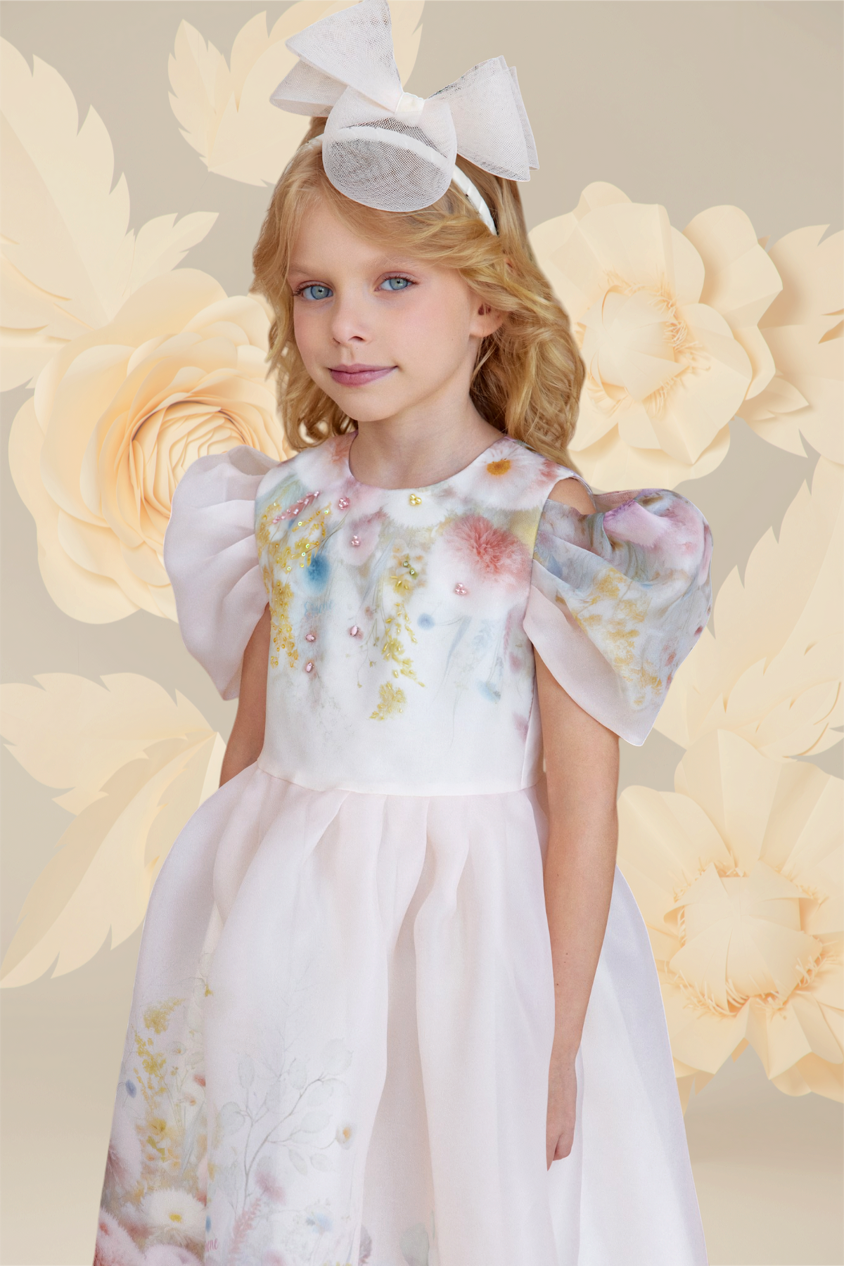 Light peach floral organza dress with puff sleeves and hand-made embellishments
