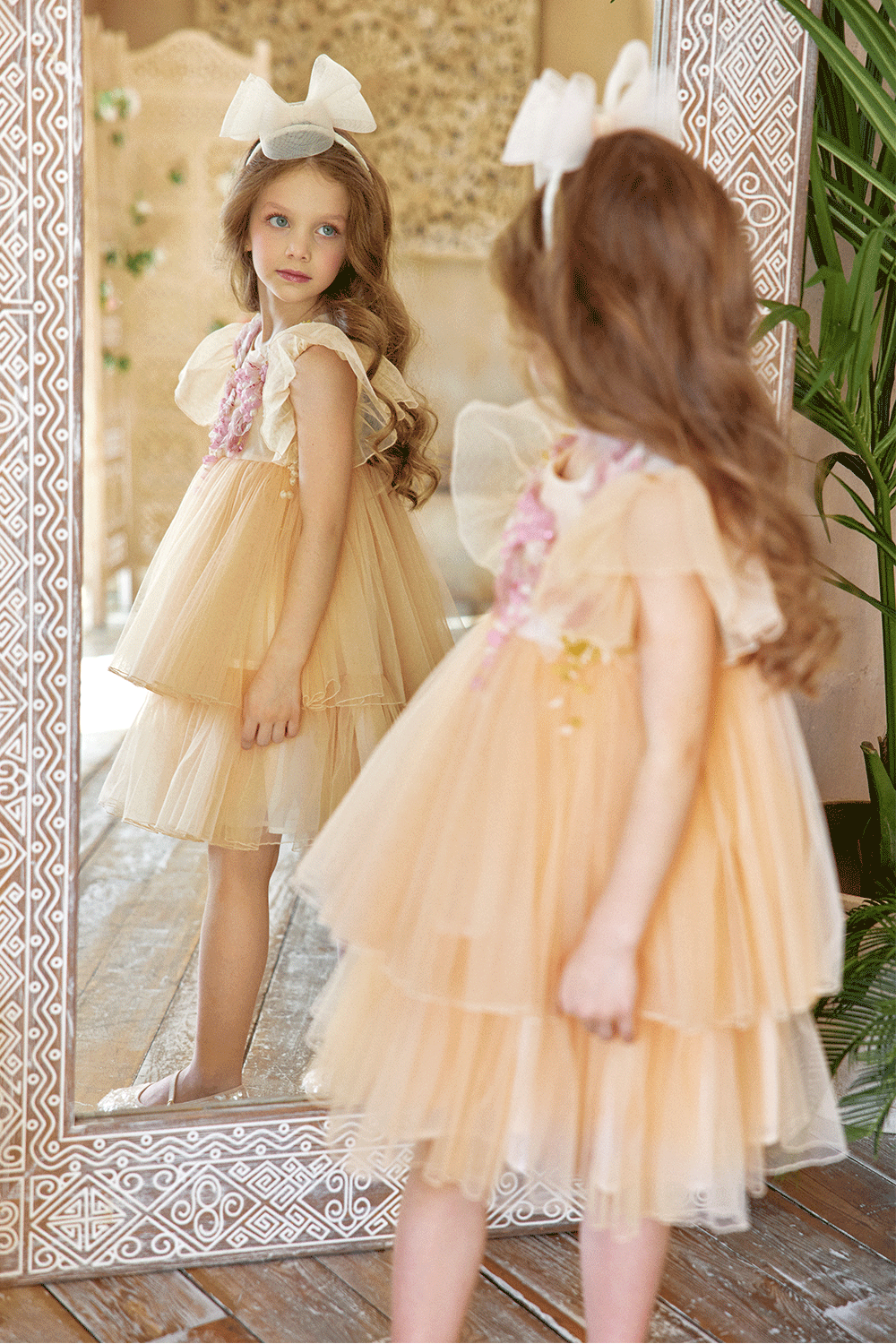 Peach tulle dress with flutter sleeves and hand-embellished 3D flowers