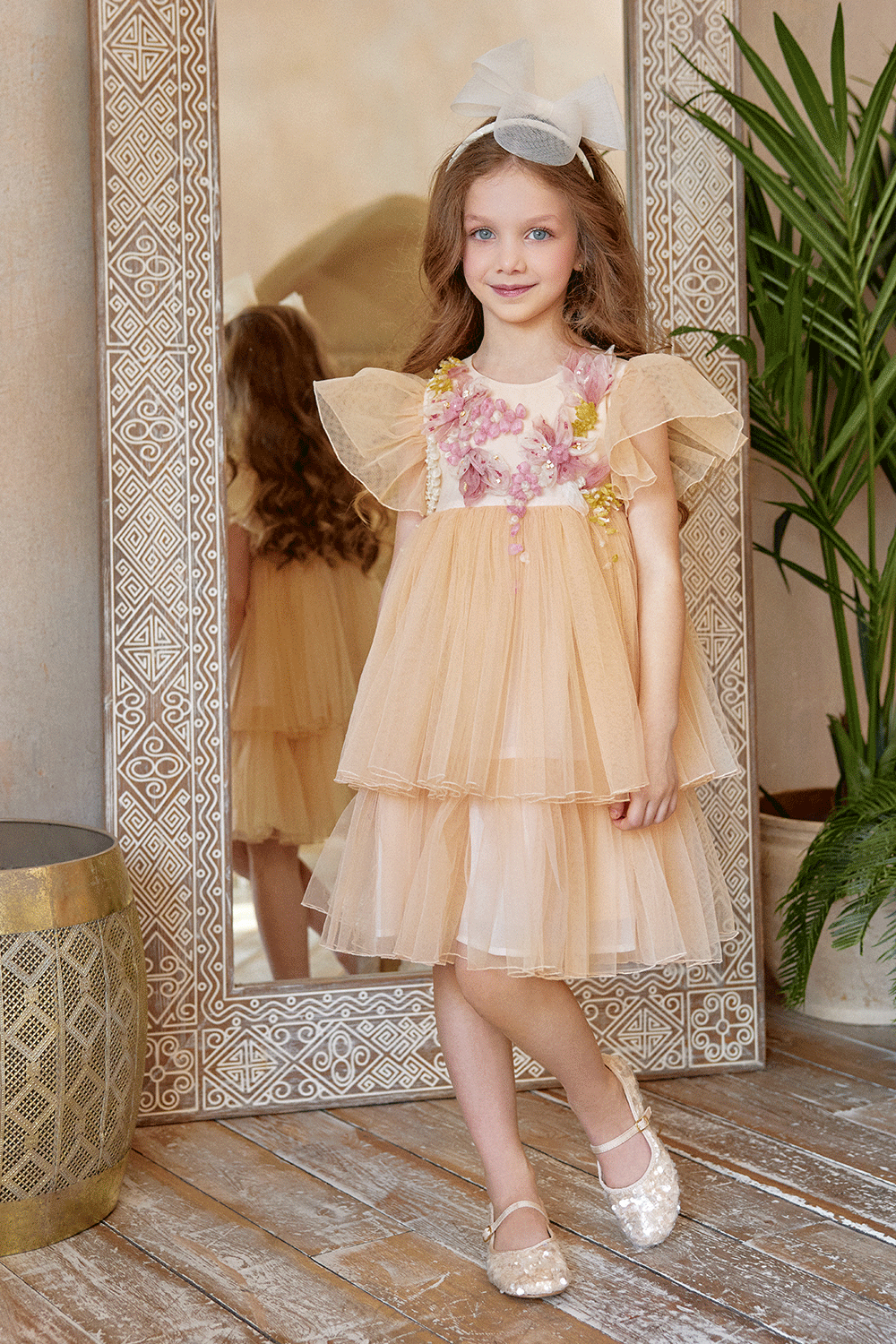 Peach tulle dress with flutter sleeves and hand-embellished 3D flowers