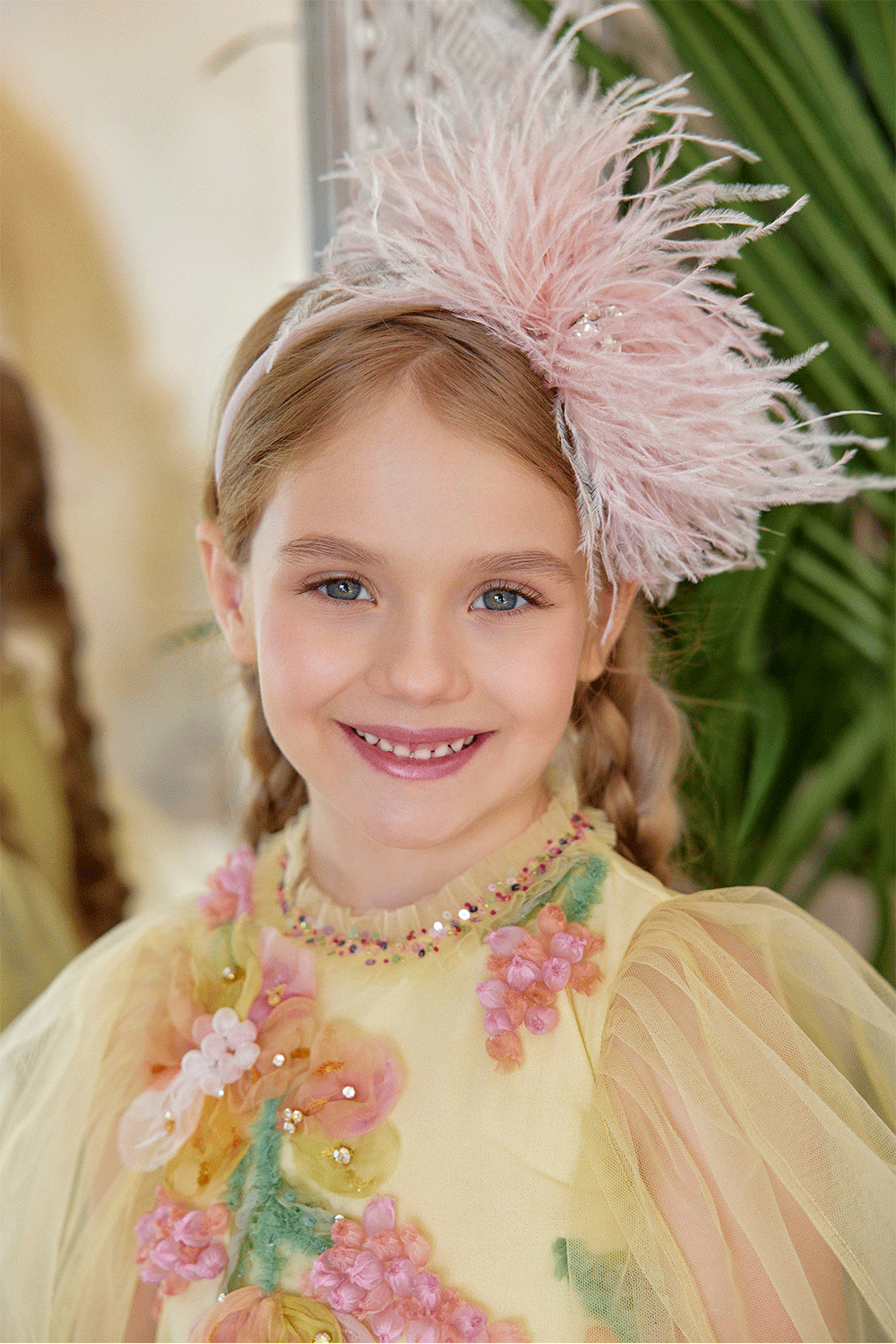 Yellow tulle dress with hand-embellished 3D flowers and tulle sleeves