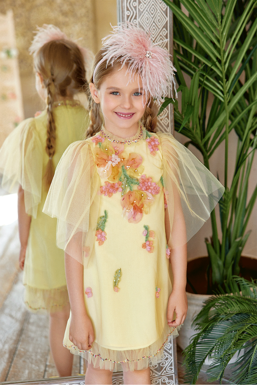 Yellow tulle dress with hand-embellished 3D flowers and tulle sleeves