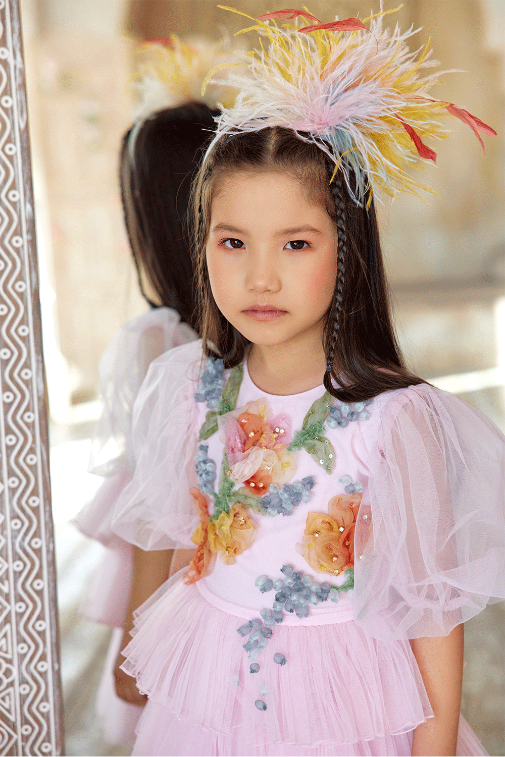 Pink tulle dress with puff sleeves and hand-embellished 3D flowers