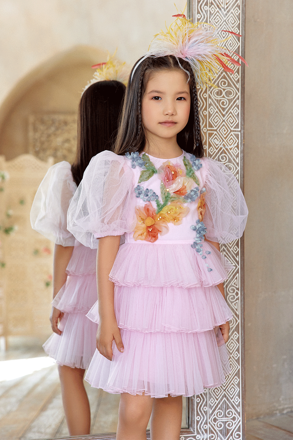 Pink tulle dress with puff sleeves and hand-embellished 3D flowers
