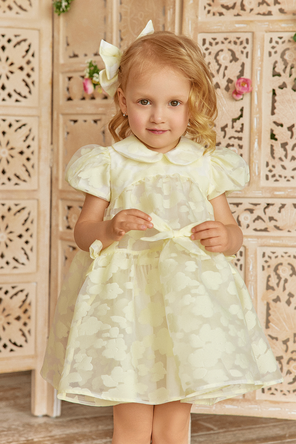 Baby organza dress with oversize bow, puff sleeves and bows