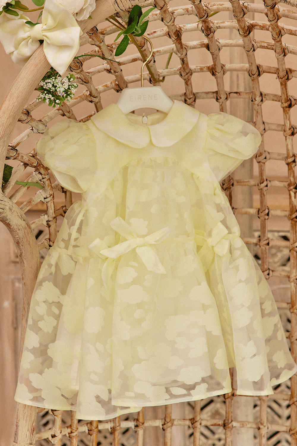 Baby organza dress with oversize bow, puff sleeves and bows