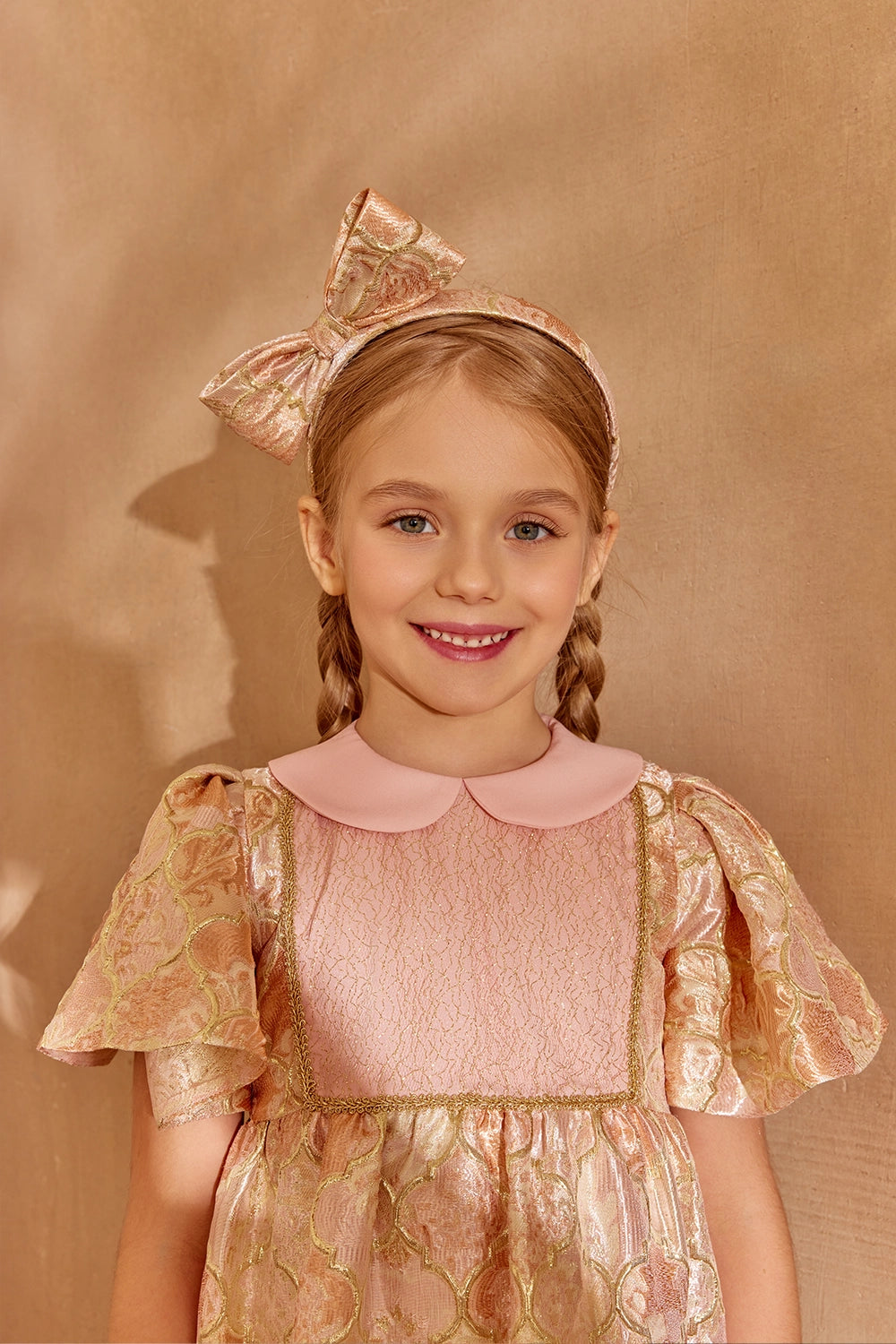 Shimmering brocade dress with flutter sleeves and contrast collar