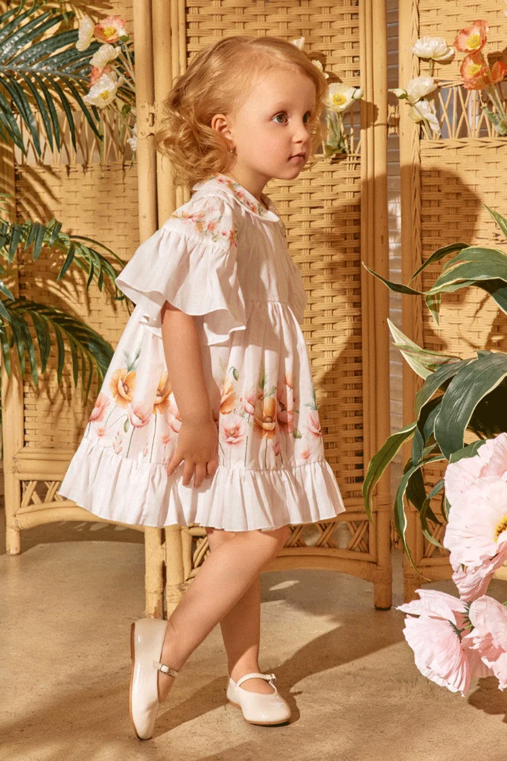 Soft pink striped dress with flutter sleeves, peter pan collar and floral print