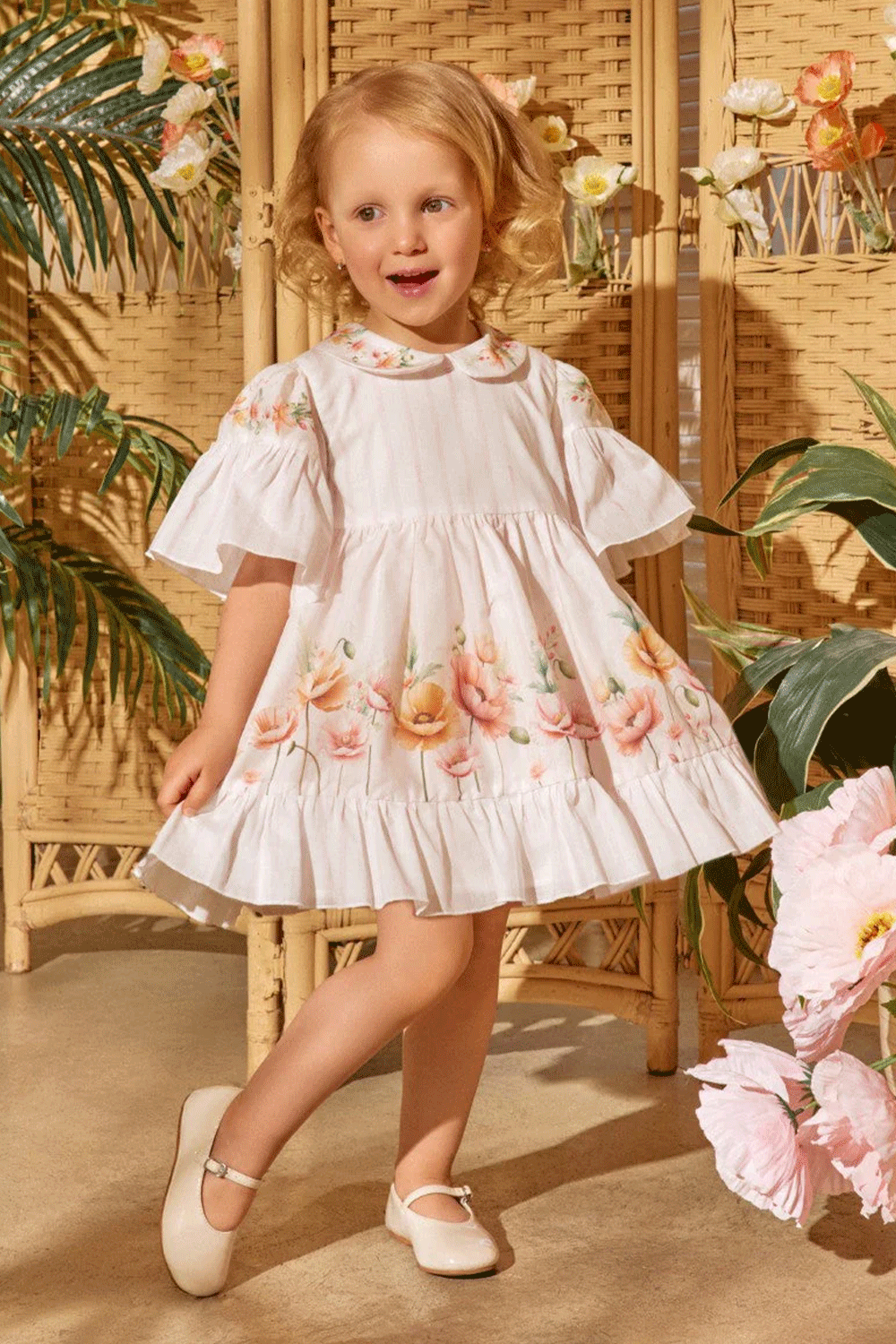 Soft pink striped dress with flutter sleeves, peter pan collar and floral print