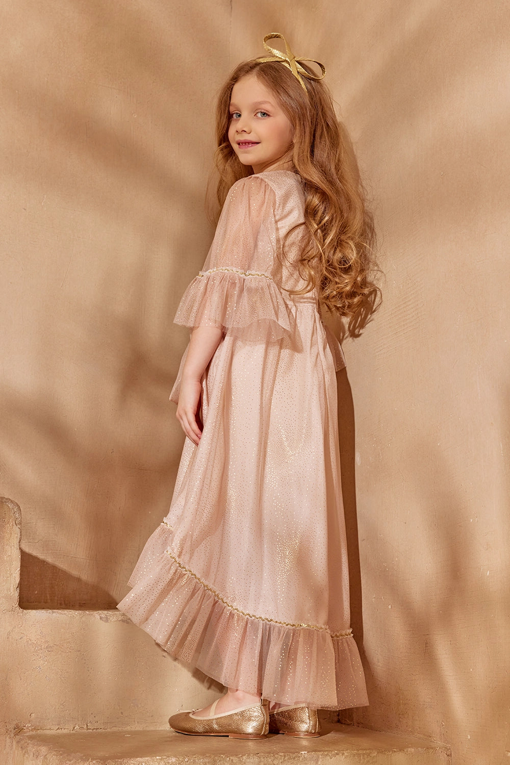 Dusty pink glitter tulle dress with flounced sleeves and a big bow