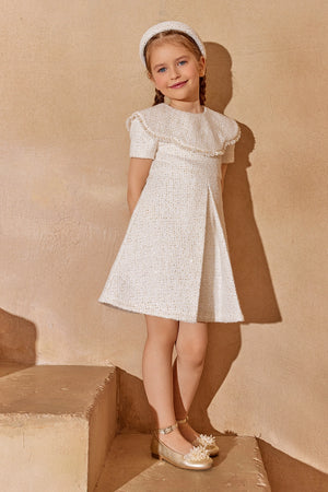 Elegant white tweed dress with pleated front and fringe trim
