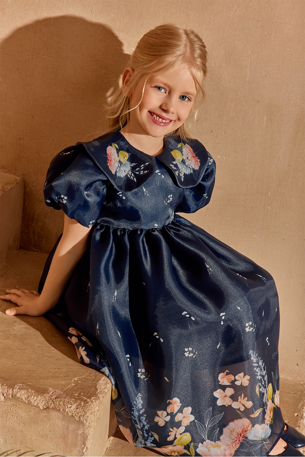Midnight floral dress with short puffed sleeves and hand-embelished collar