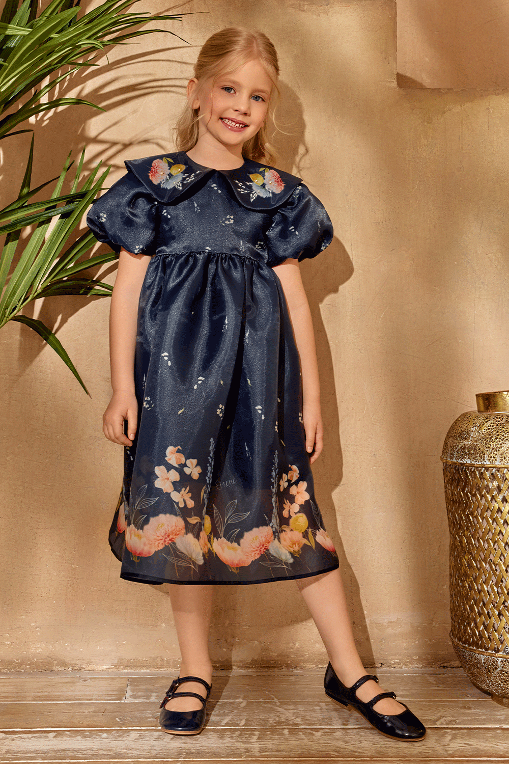 Midnight floral dress with short puffed sleeves and hand-embelished collar