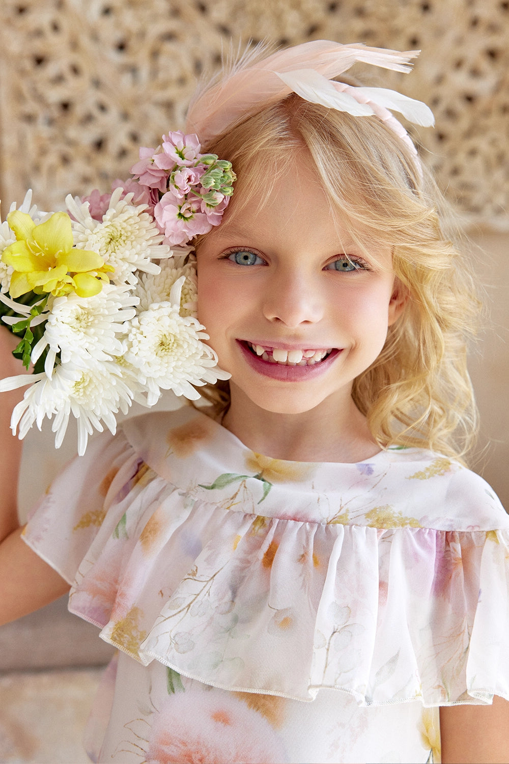 Light chiffon dress with flower print and cape sleeves