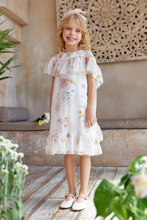 Light chiffon dress with flower print and cape sleeves