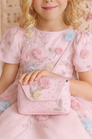Pink mini bag with hand-embroidered pastel 3D floral appliqués, sequins, and leafs