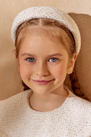 White tweed padded headband with subtle gold shimmer