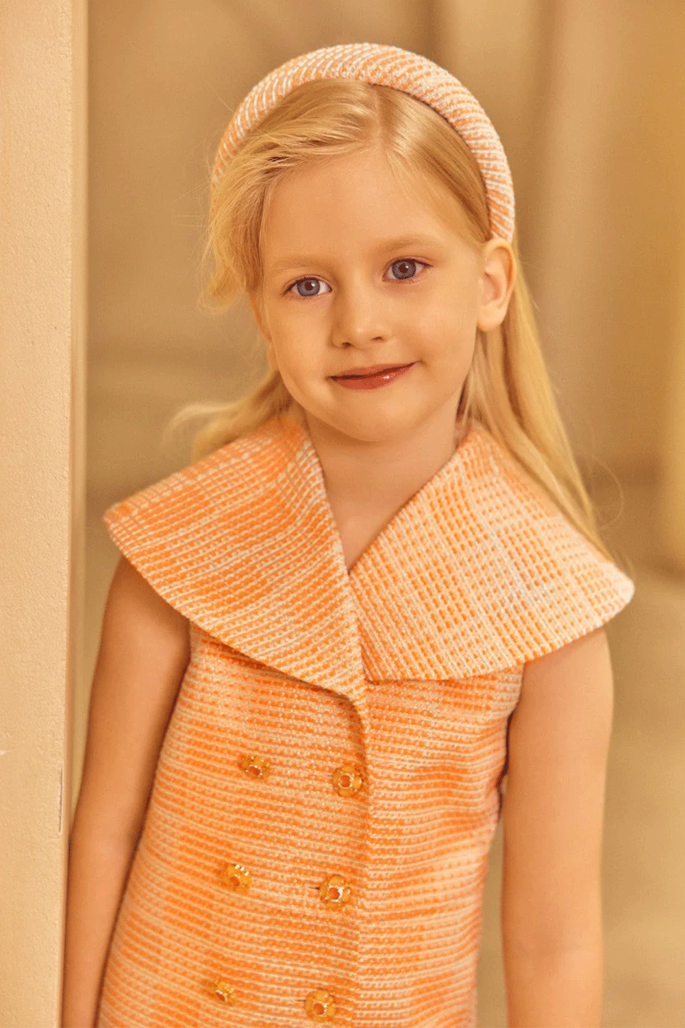 Sleeveless A-line dress in coral, aqua and rose gold tweed with a wide sailor collar and double-breasted button detail