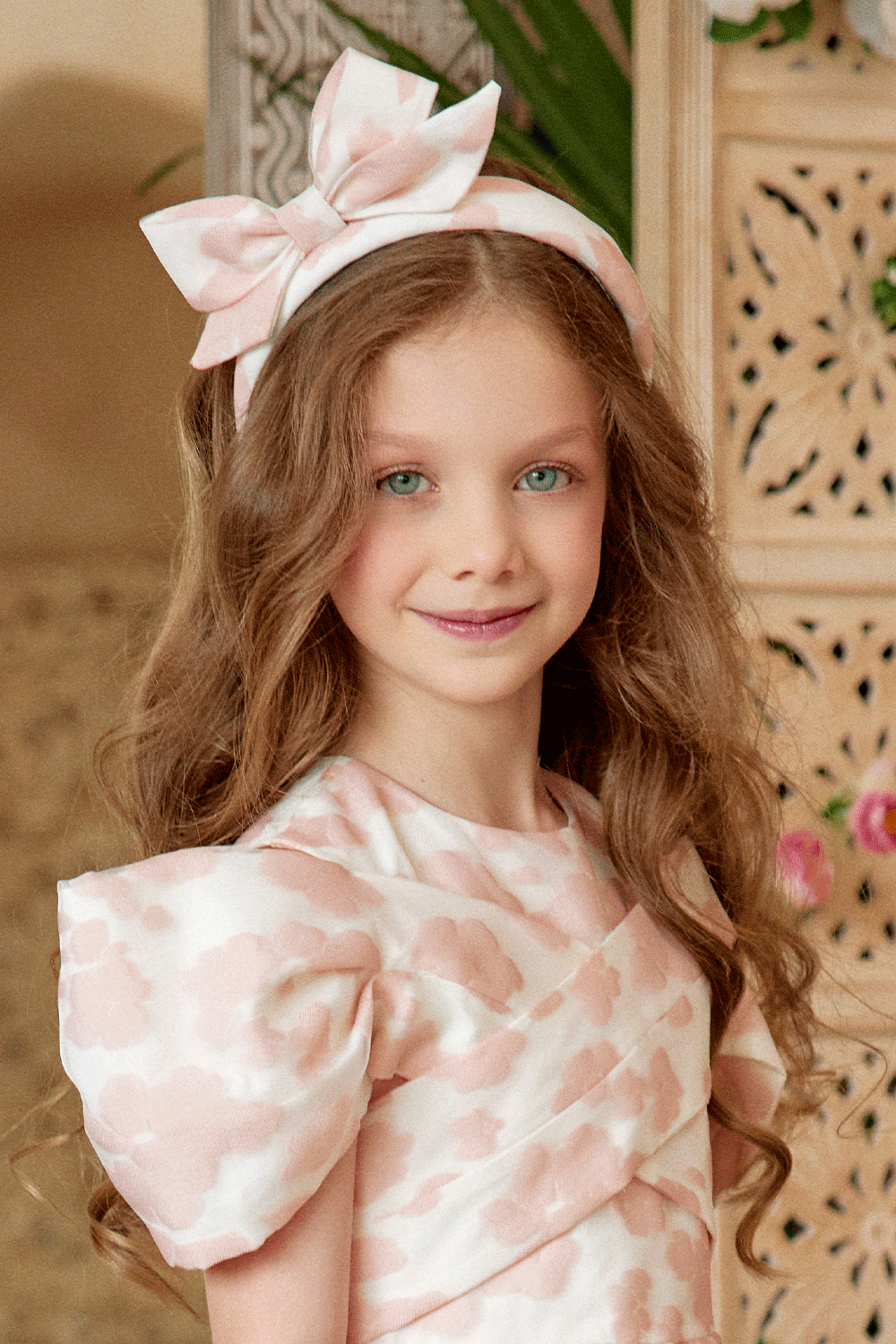 Blush pink organza headband with a bow